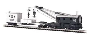 A train set with a crane and other items.