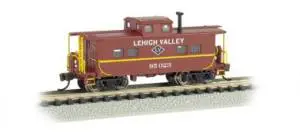 A red caboose with yellow lettering and the words " lehigh valley ".