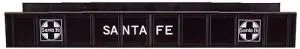 A black sign with white letters that say " santa fe ".