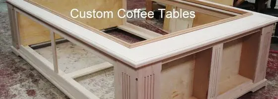 A custom coffee table with marble top and glass display.